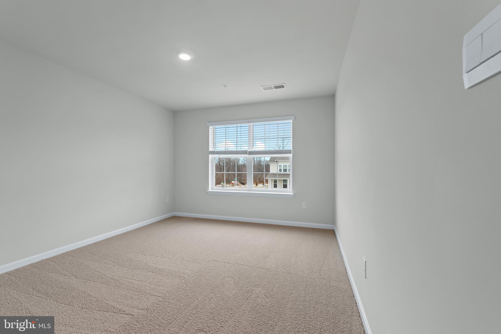 1204 Otter Point Middle River, MD 21220 - Photo 18 of 32 an empty room with a window