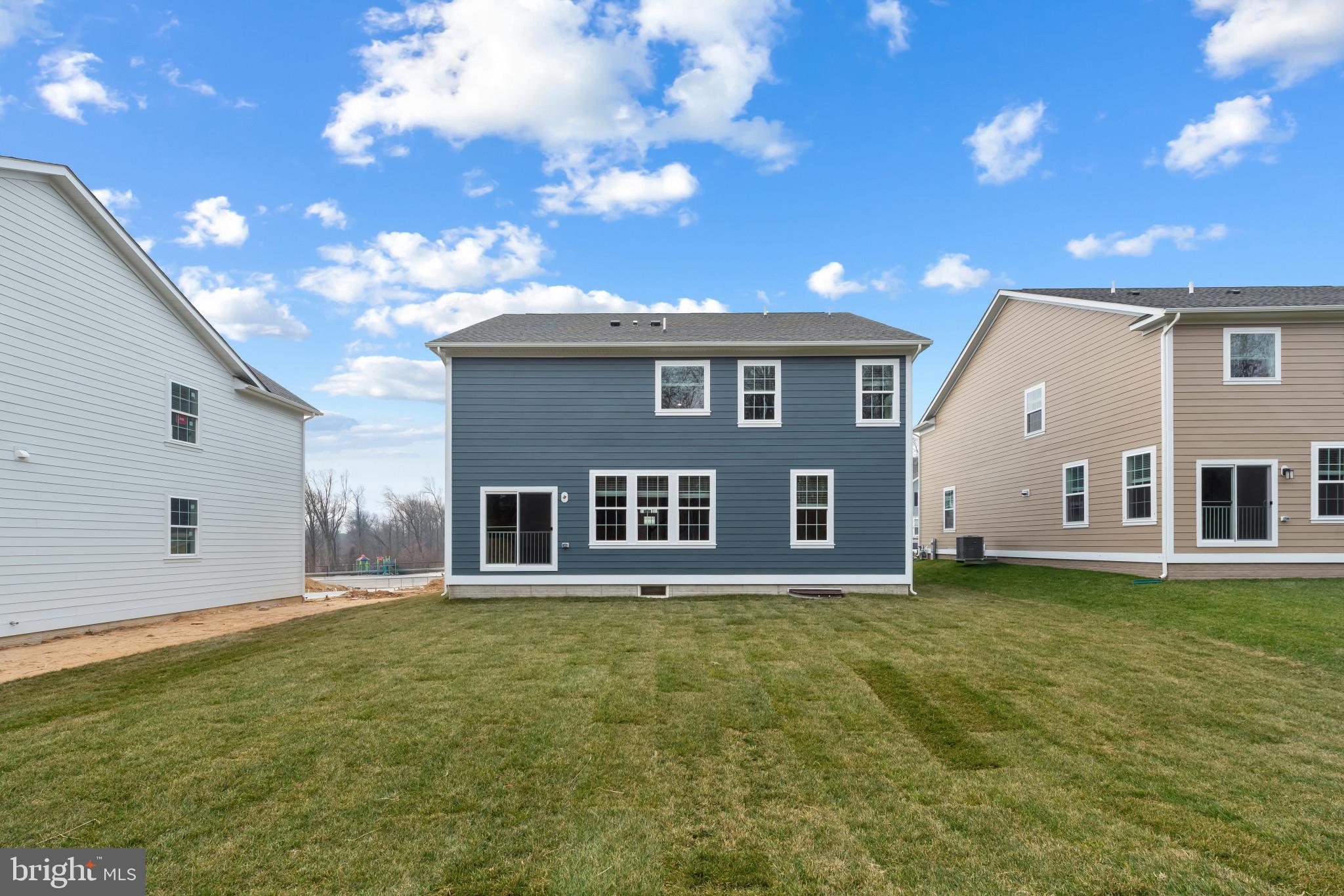 1204 Otter Point Middle River, MD 21220 - Photo 2 of 32 a house view with a garden space