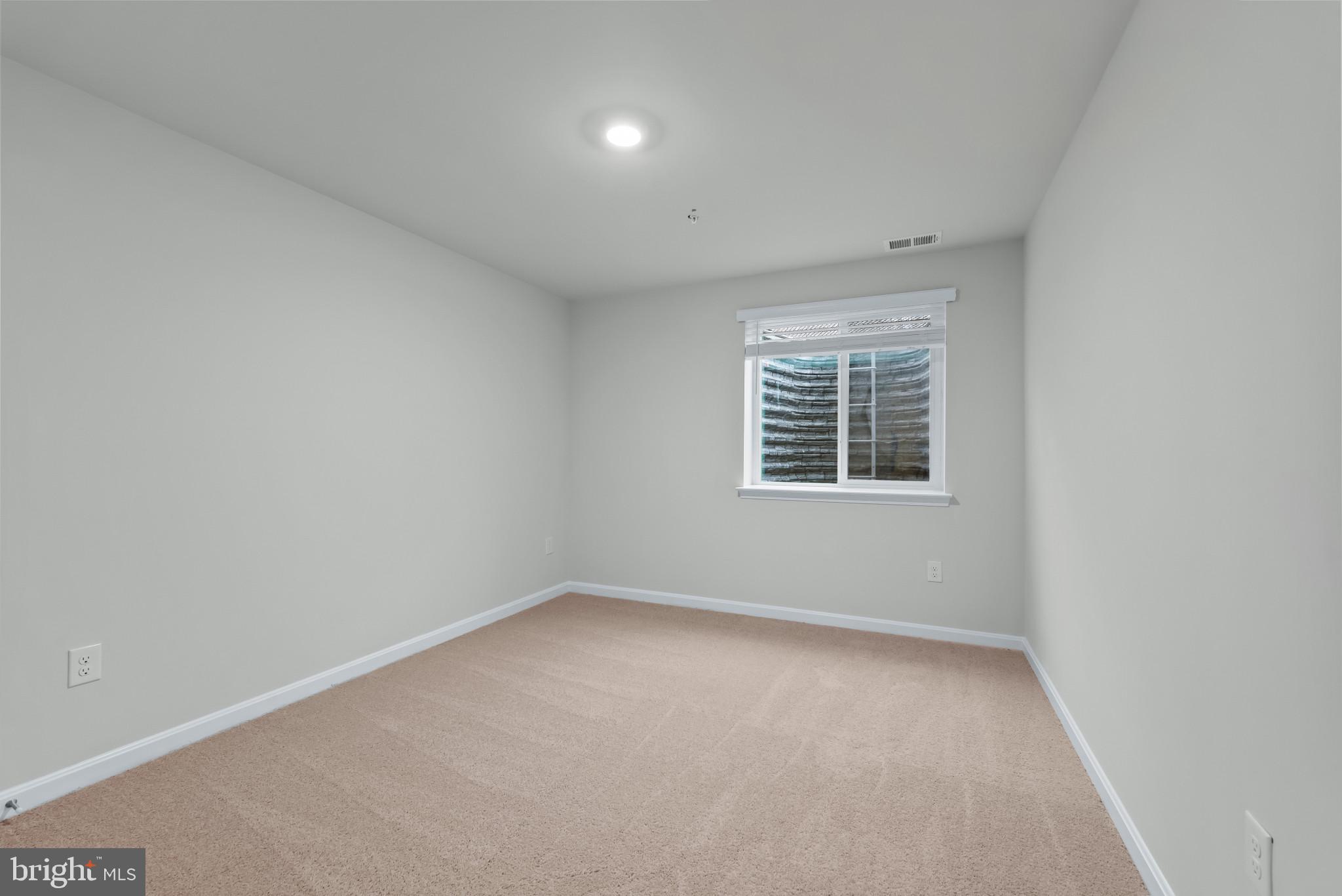 1204 Otter Point Middle River, MD 21220 - Photo 31 of 32 an empty room with a window