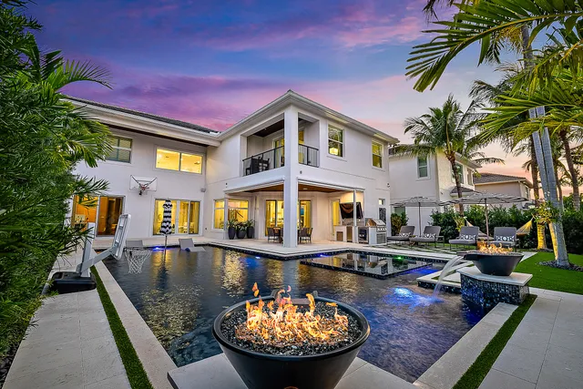 a view of a swimming pool with a patio