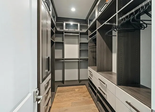 a living room with furniture a couch and a chandelier