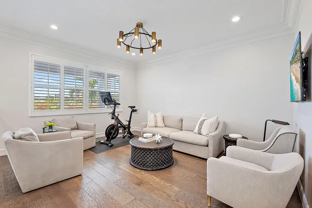a table and chairs in front of a door