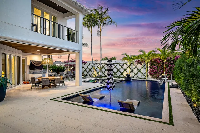a view of houses with an outdoor space and lakeside
