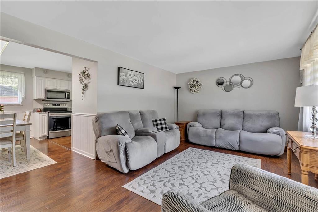 765 Catherine Street Rochester, PA 15074 - Photo 10 of 30 a living room with furniture and wooden floor