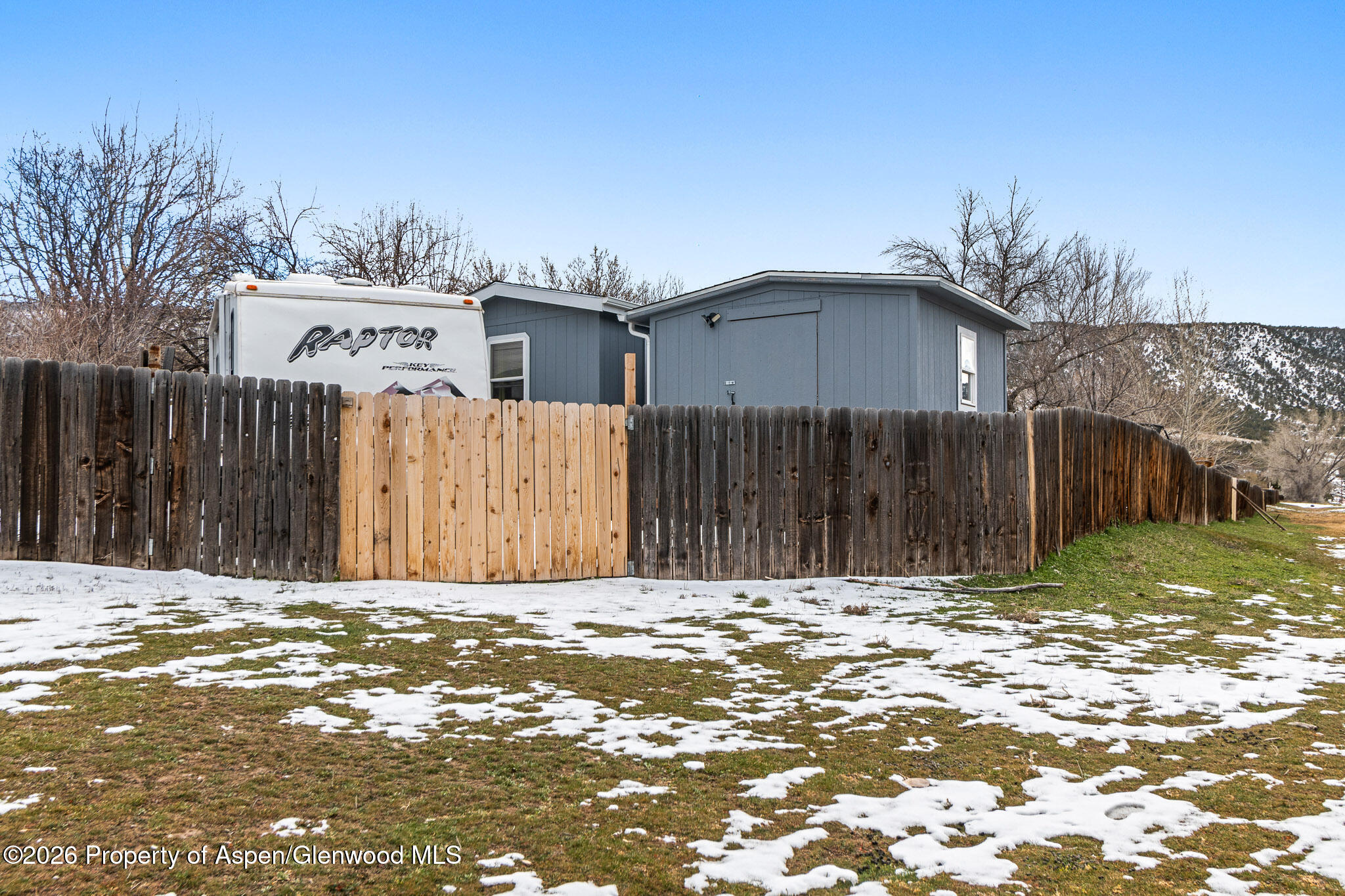 106 Cedar Circle Parachute, CO 81635 - Photo 35 of 35 a view of a house with a fence