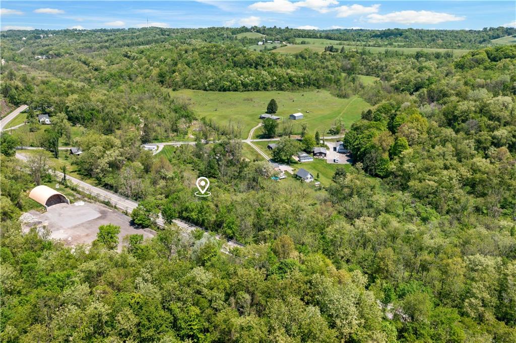 20 Coleman Road McDonald, PA 15057 - Photo 30 of 39 a view of a lush green forest with lots of trees