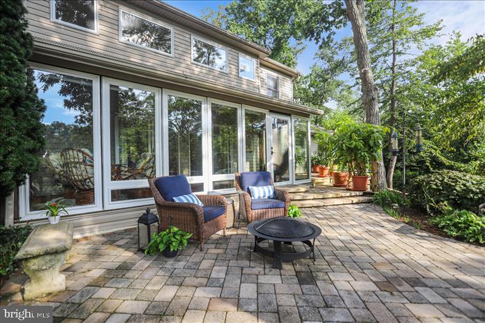 317 Thomas Road Severna Park, MD 21146 - Photo 11 of 56 Great waterfront patio outside of sunroom