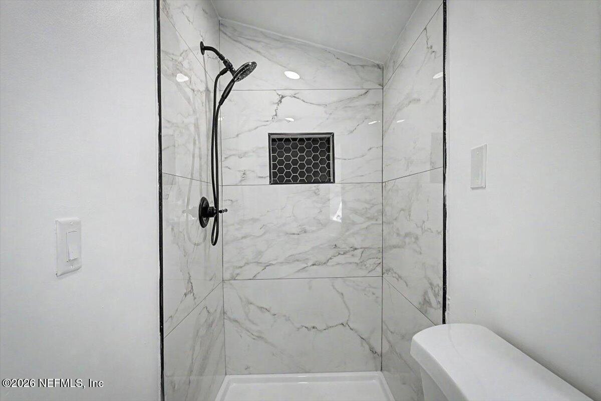2520 Larsen Road Jacksonville, FL 32207 - Photo 23 of 27 a bathroom with a shower