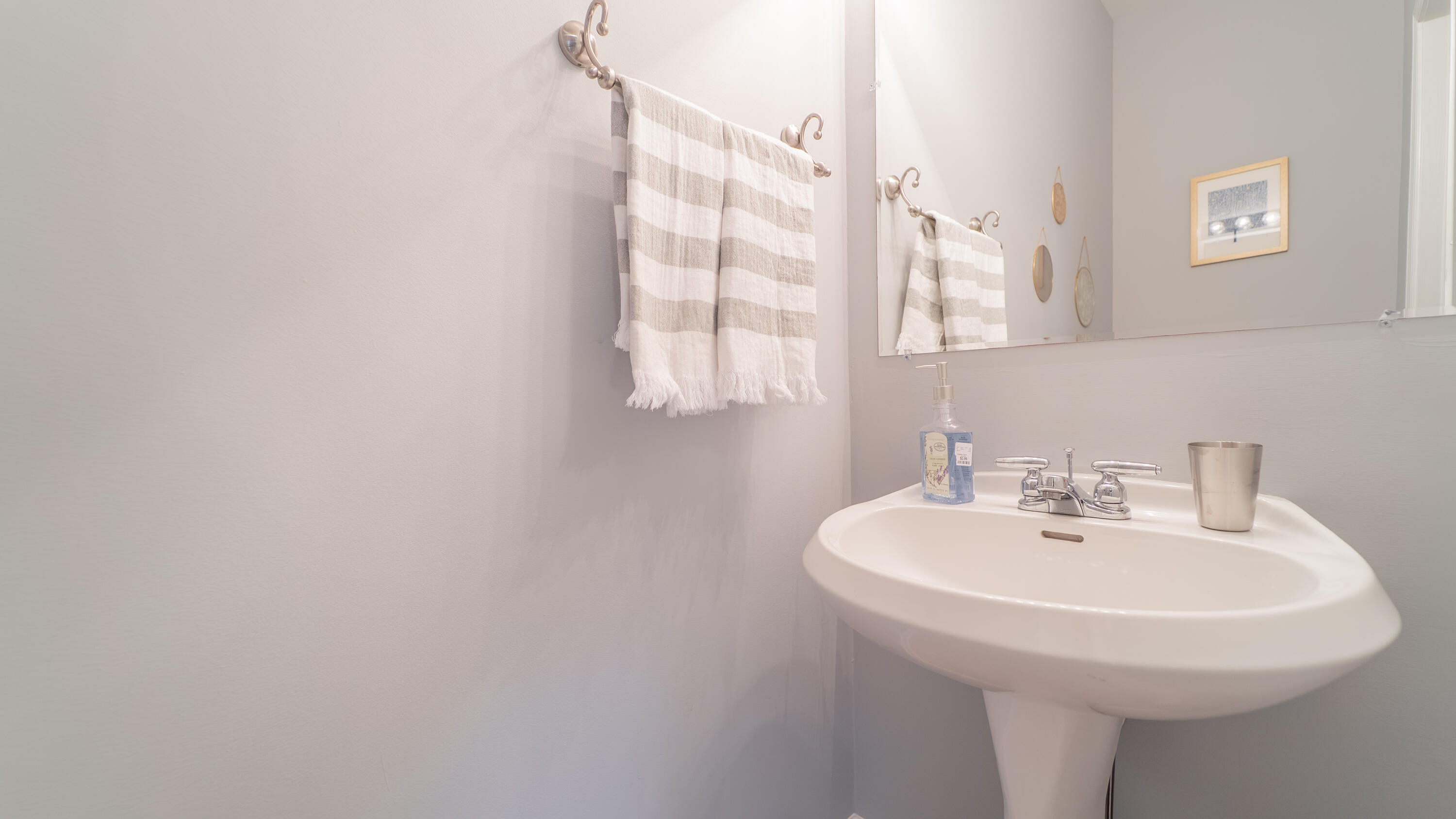 2898 Cambridge Way Highland, IN 46322 - Photo 11 of 22 a bathroom with a sink and a mirror