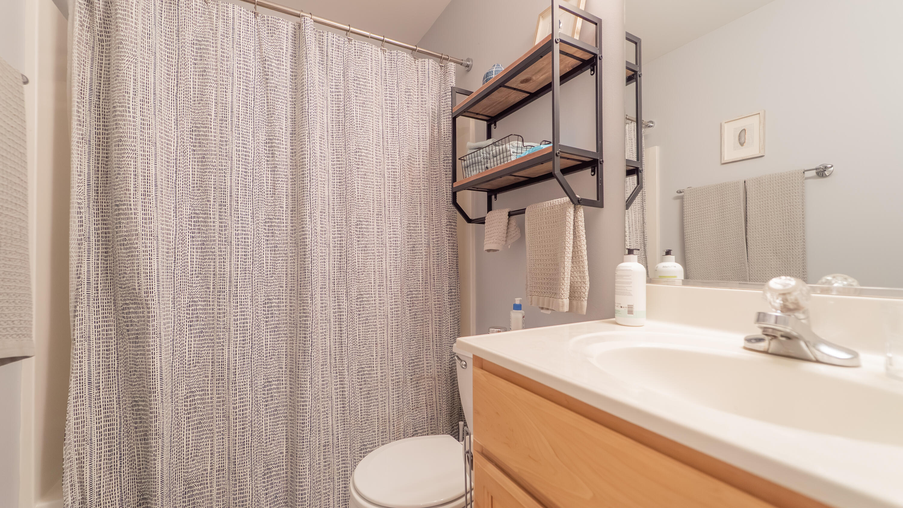 2898 Cambridge Way Highland, IN 46322 - Photo 14 of 22 a bathroom with a sink a toilet and shower