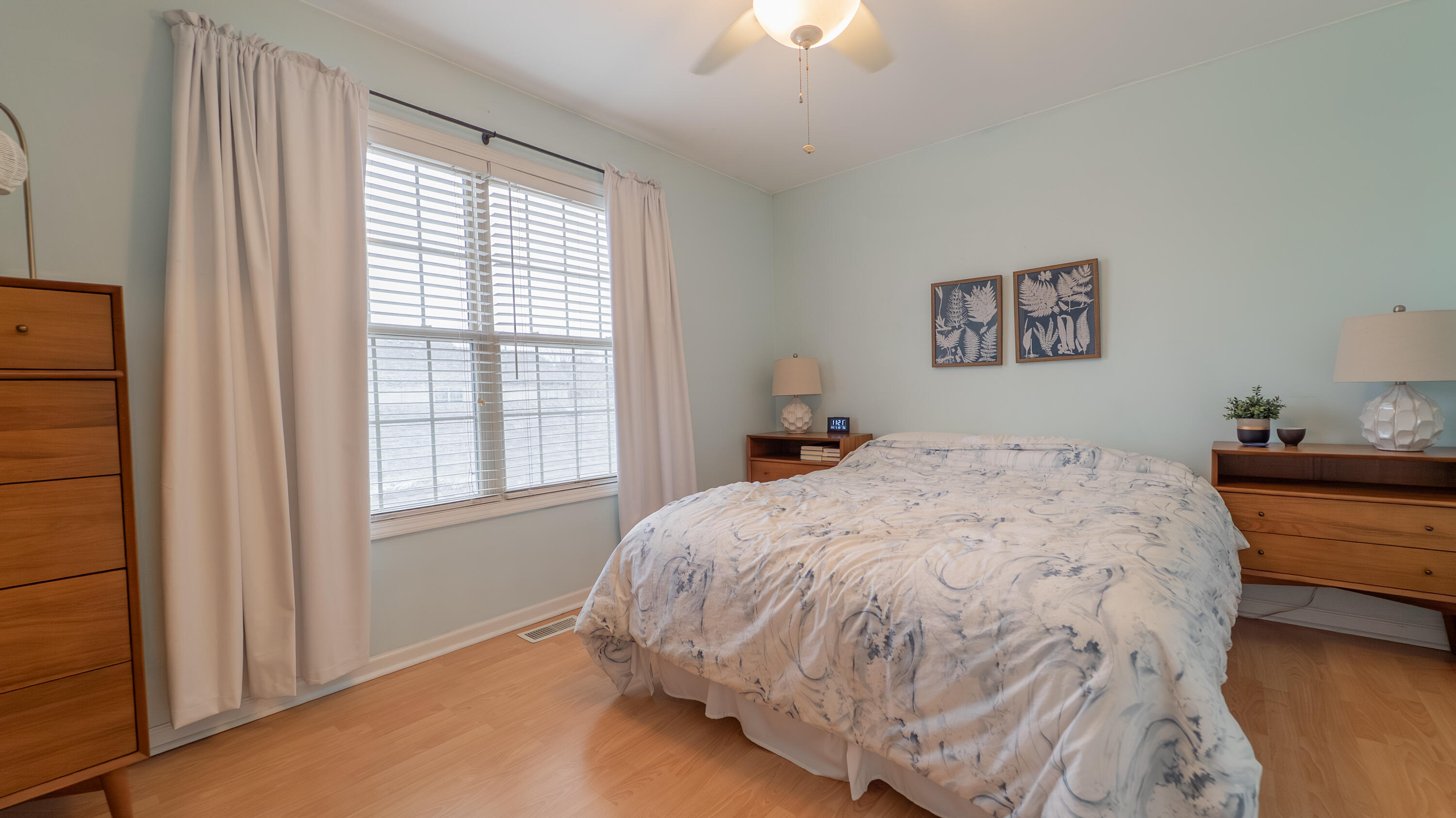 2898 Cambridge Way Highland, IN 46322 - Photo 15 of 22 a bedroom with a bed and a window
