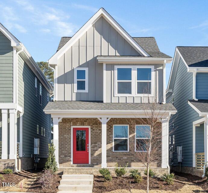 344 Cottage Hl Way Raleigh, NC 27604 - Photo 1 of 33 a front view of a house with a yard