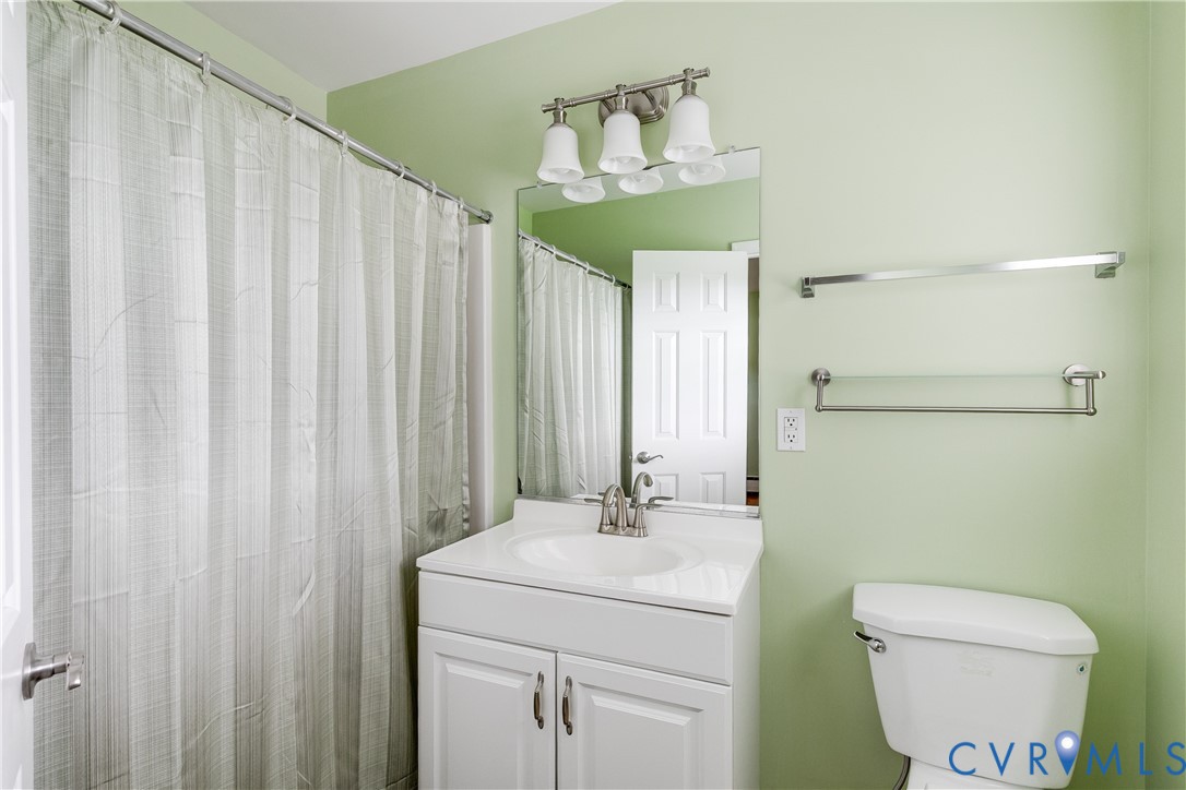 12365 Ashcake Road Ashland, VA 23005 - Photo 39 of 80 Full bathroom in bedroom #2 with a white vanity fe