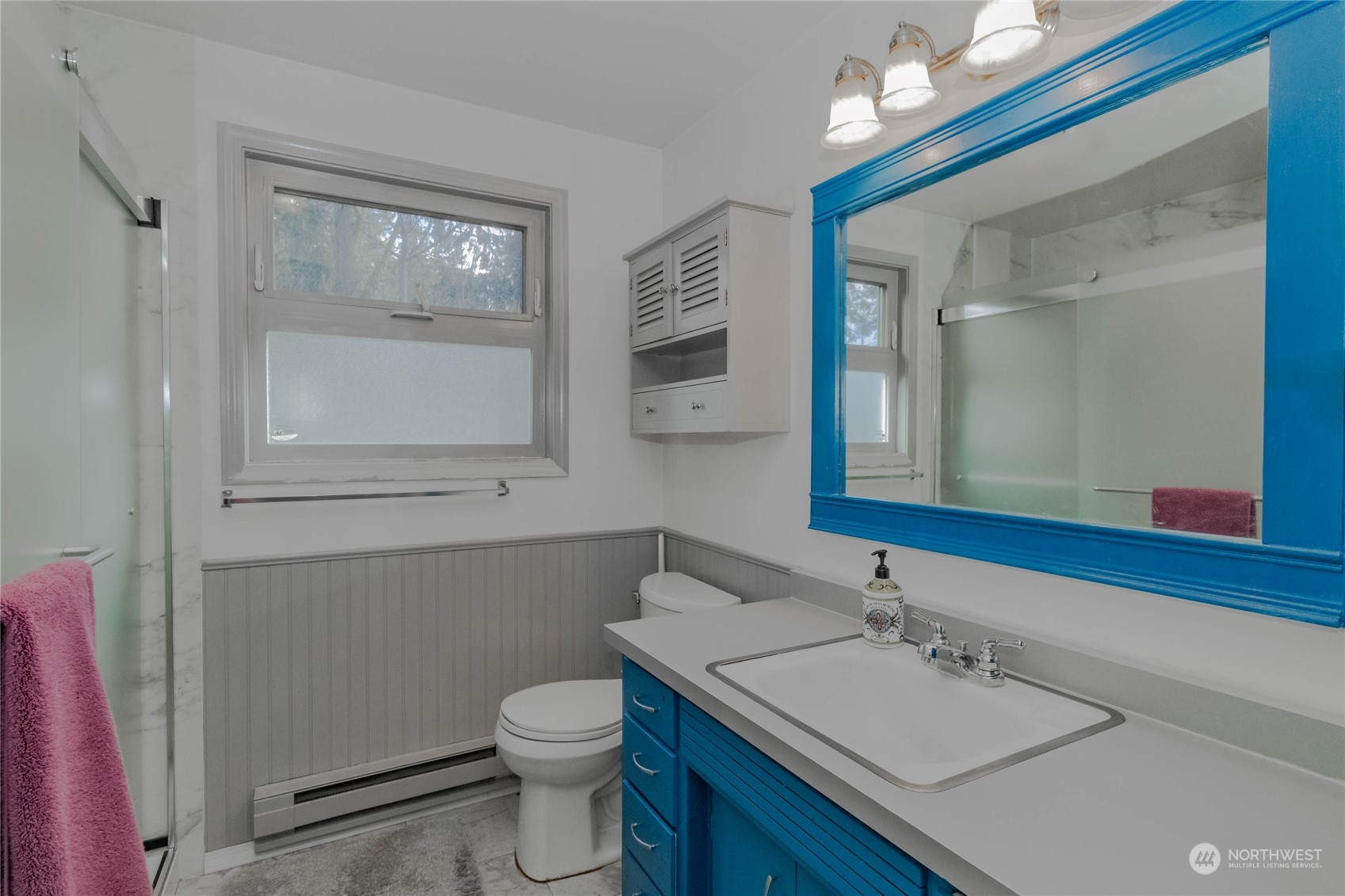 4512 Southeast 2nd Place Renton, WA 98059 - Photo 21 of 39 a bathroom with a sink vanity granite and toilet