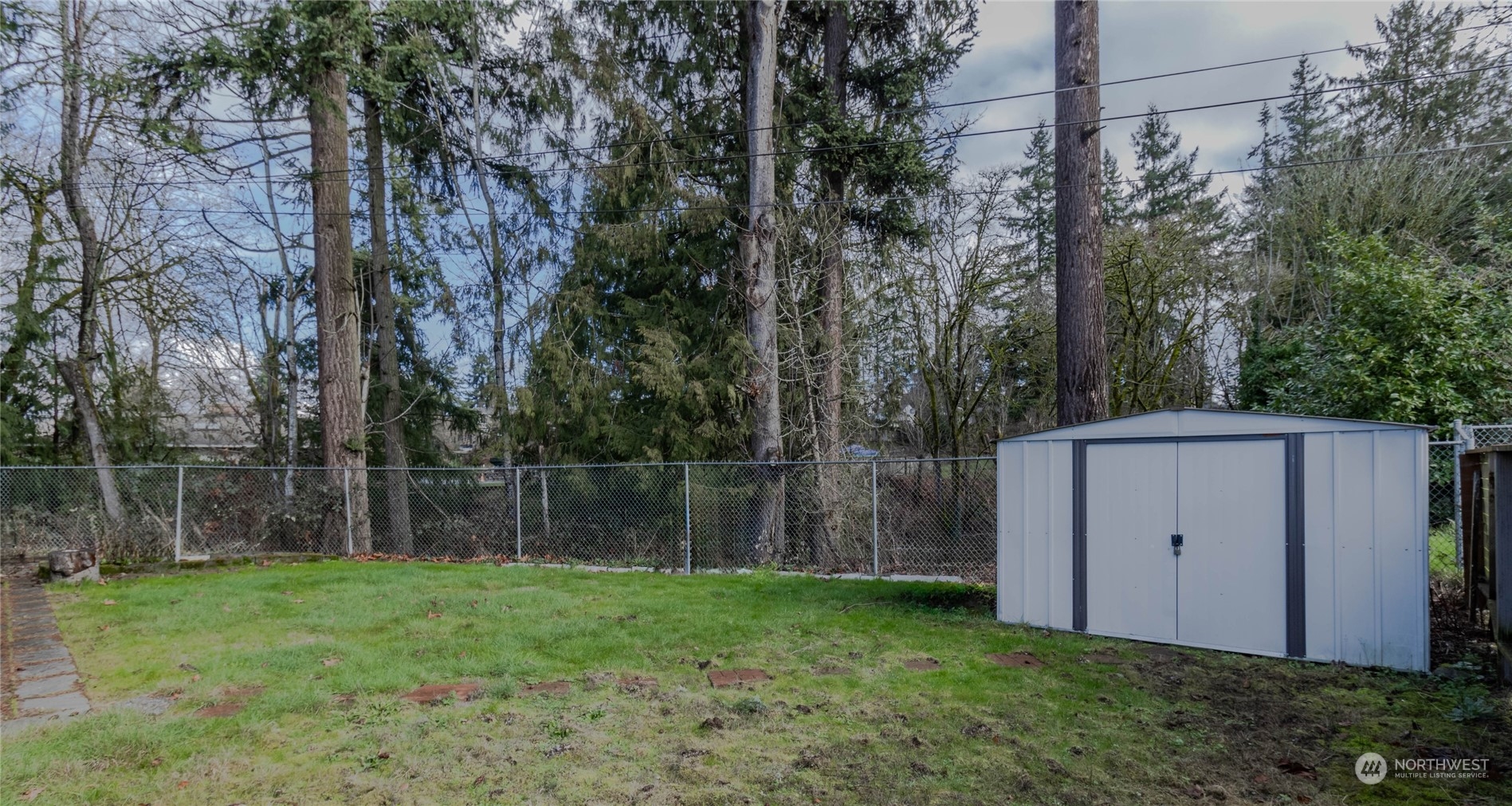 4512 Southeast 2nd Place Renton, WA 98059 - Photo 29 of 39 a backyard of a house with lots of green space