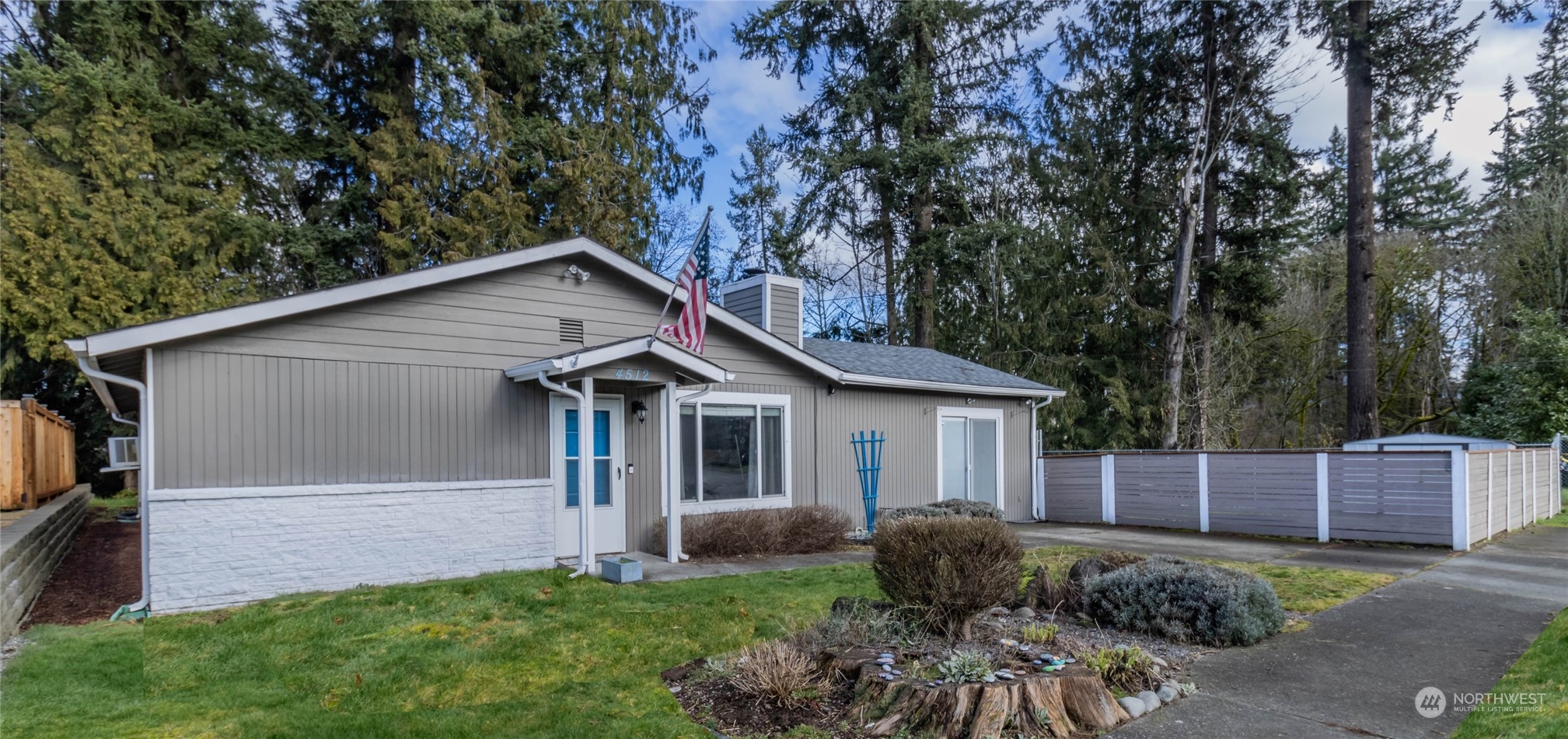 4512 Southeast 2nd Place Renton, WA 98059 - Photo 3 of 39 a view of backyard of house with green space