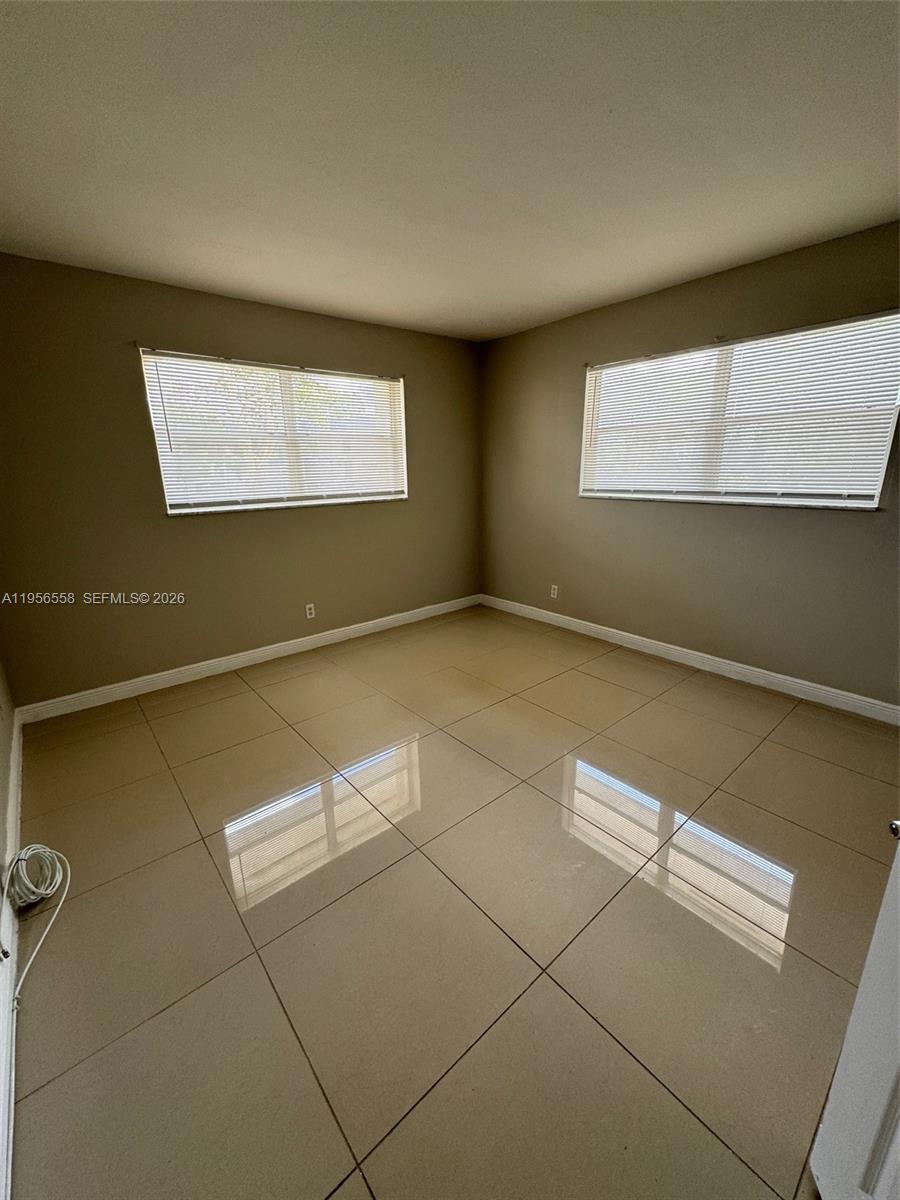 8060 Fairview Drive, Unit 201 Tamarac, FL 33321 - Photo 14 of 33 a view of an empty room