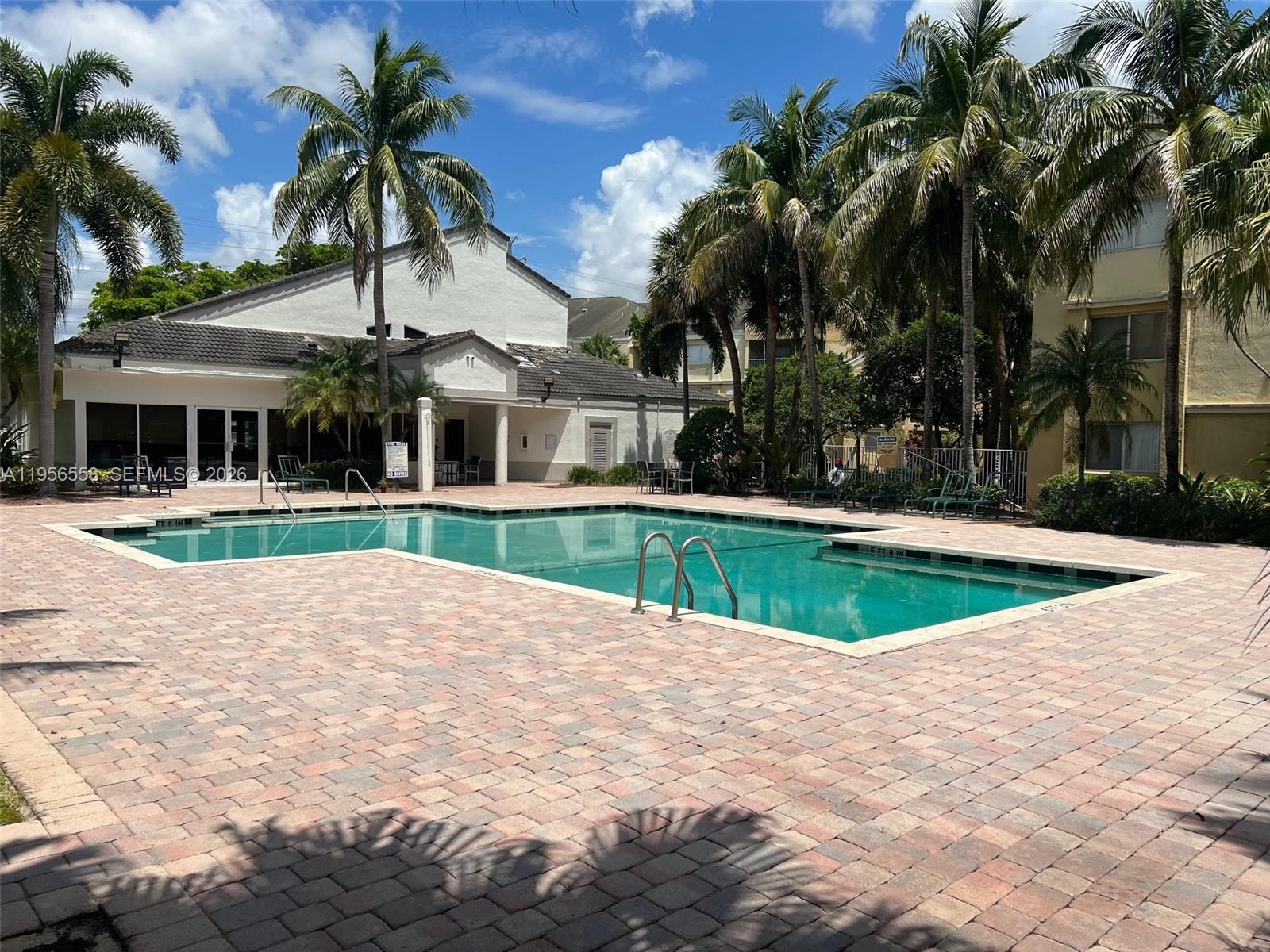 8060 Fairview Drive, Unit 201 Tamarac, FL 33321 - Photo 33 of 33 a view of outdoor space yard and swimming pool