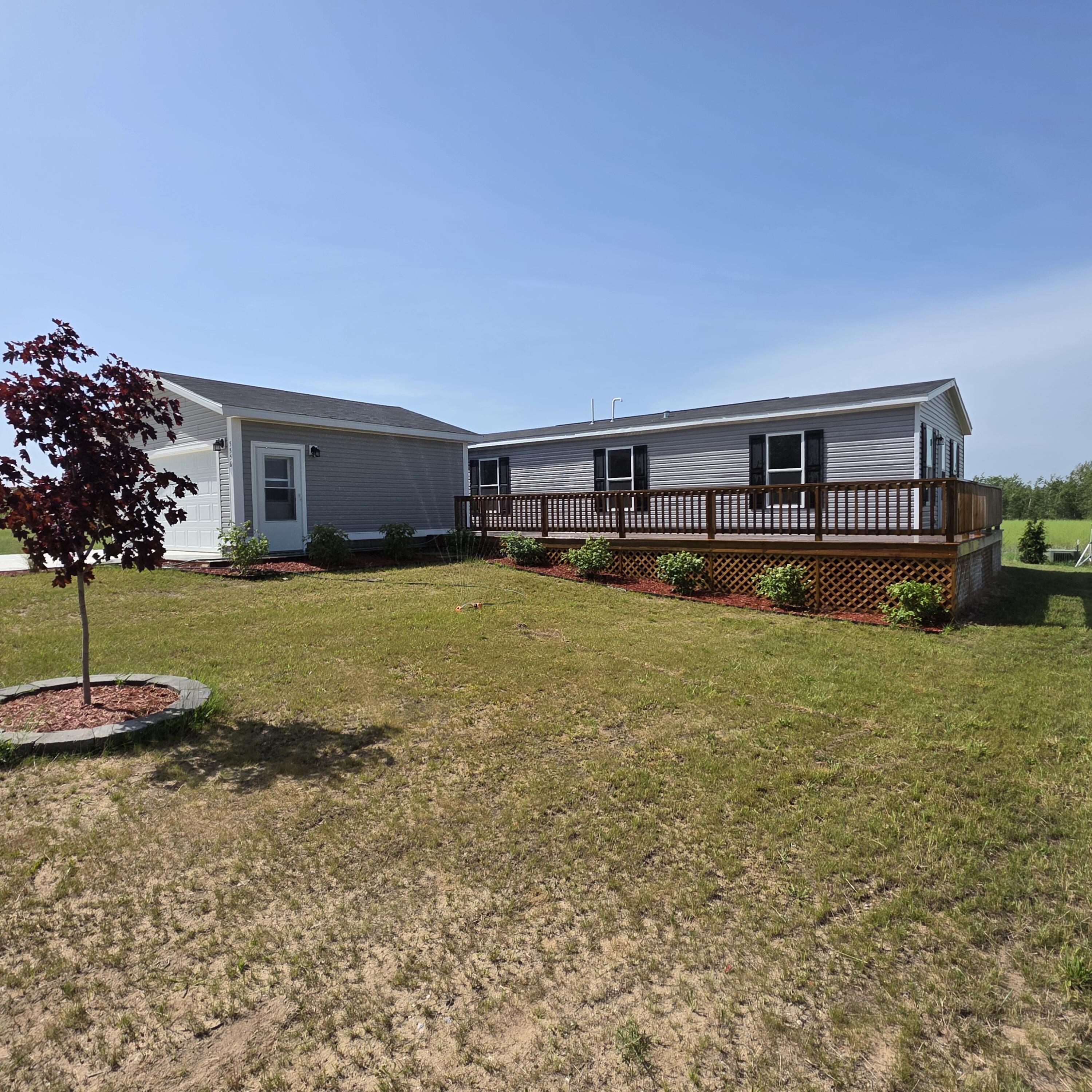 5556 West Lake Road Hart, MI 49420 - Photo 1 of 27 20260701_163101