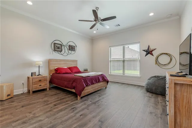 a bed room with a bed and a window