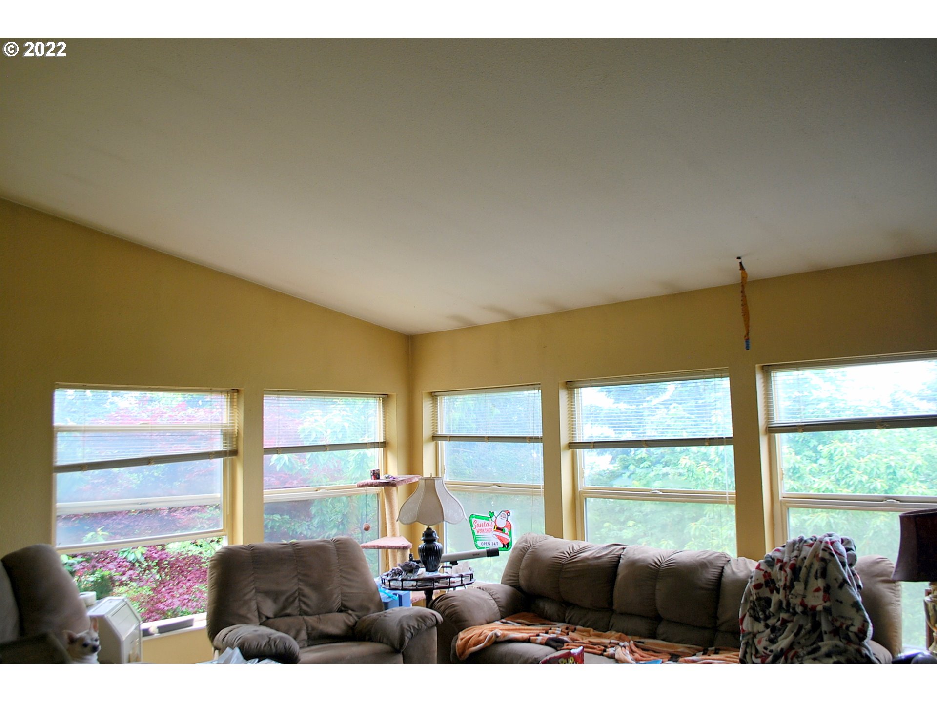 29210 Old Rainier Road Rainier, OR 97048 - Photo 19 of 32 a living room with furniture and large windows