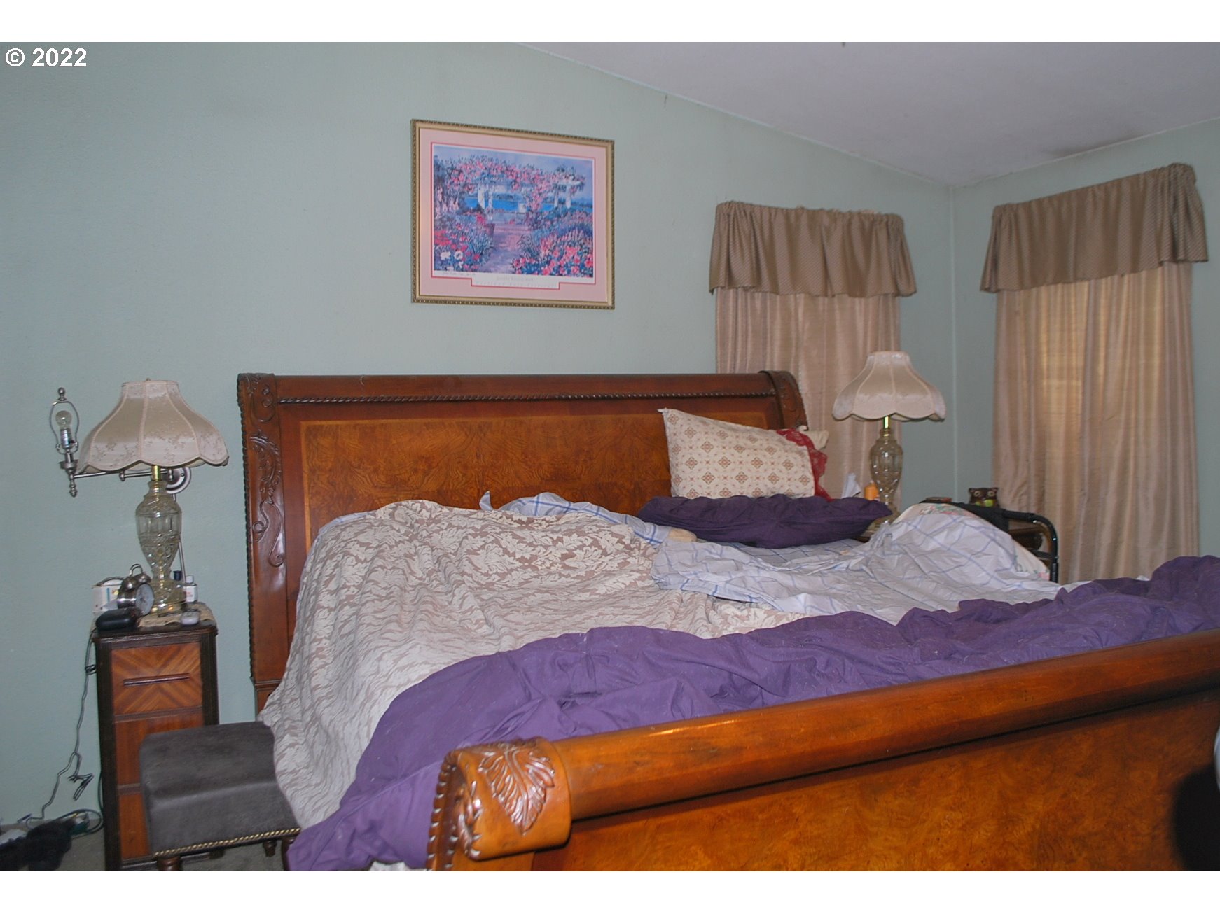 29210 Old Rainier Road Rainier, OR 97048 - Photo 10 of 32 a bedroom with a bed and a painting on the wall