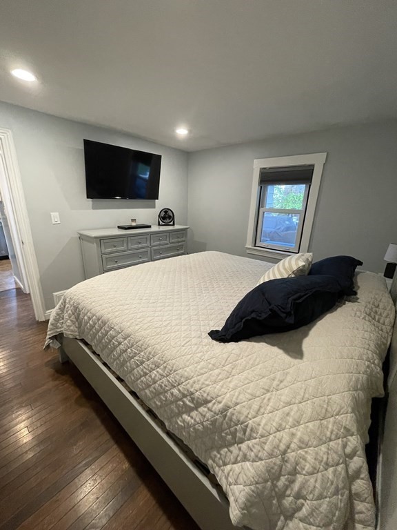 17 Audrea Road Framingham, MA 01701 - Photo 13 of 27 a bedroom with a bed and a flat screen tv