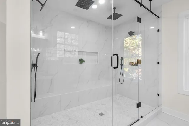 a view of a storage and utility room with closet