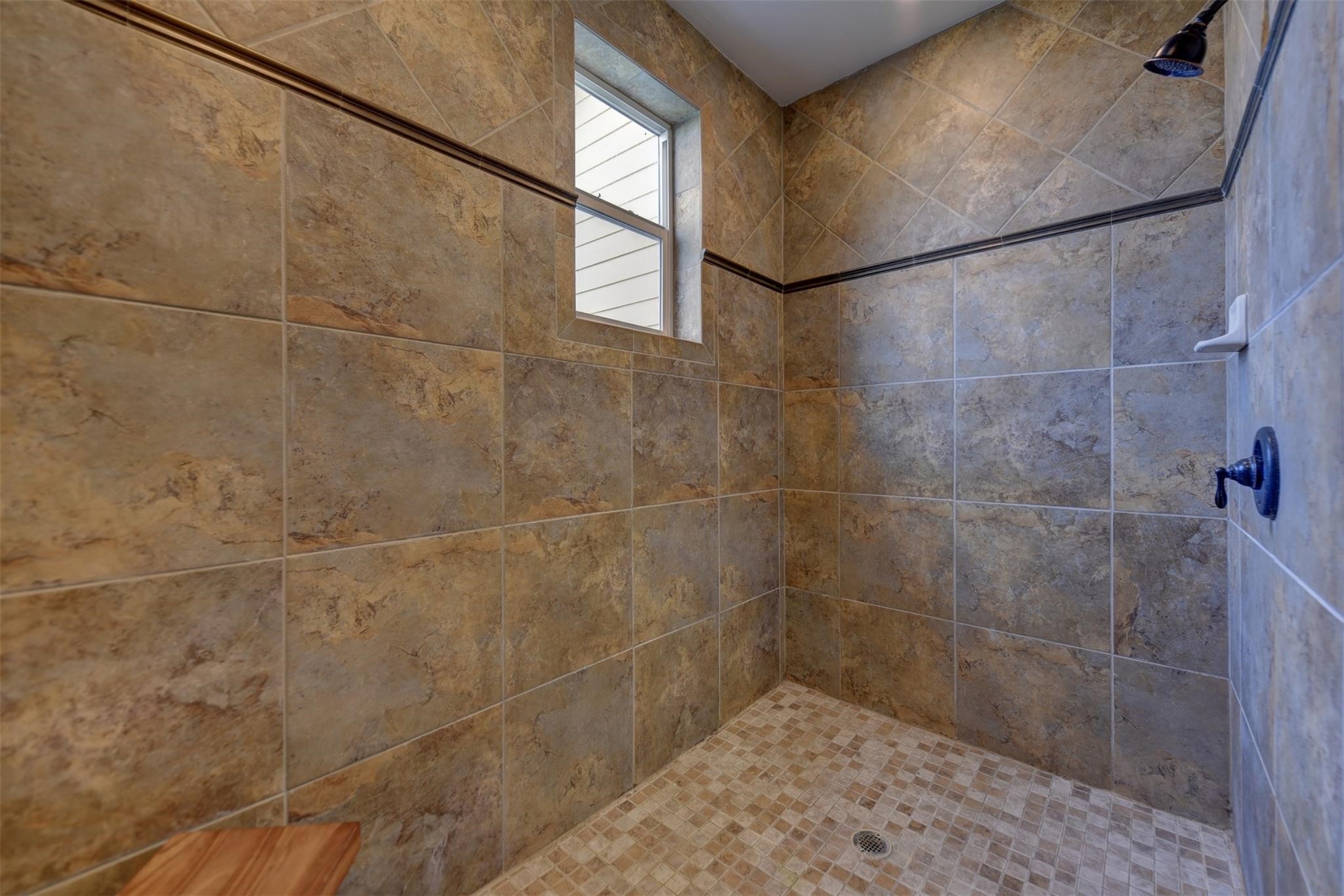 8456 Schuster Road Ledbetter, TX 78946 - Photo 24 of 49 a bathroom with a shower