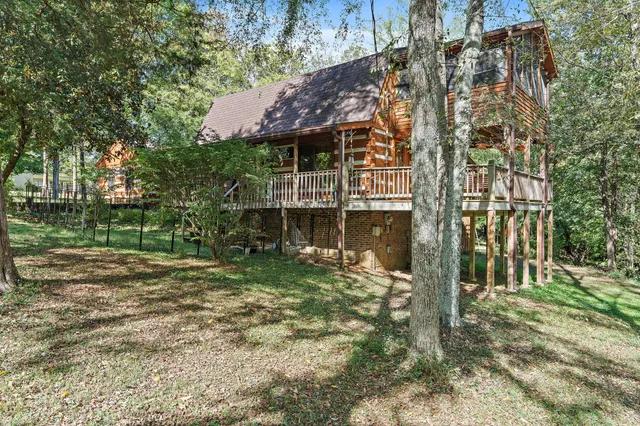 a backyard of a building with trees