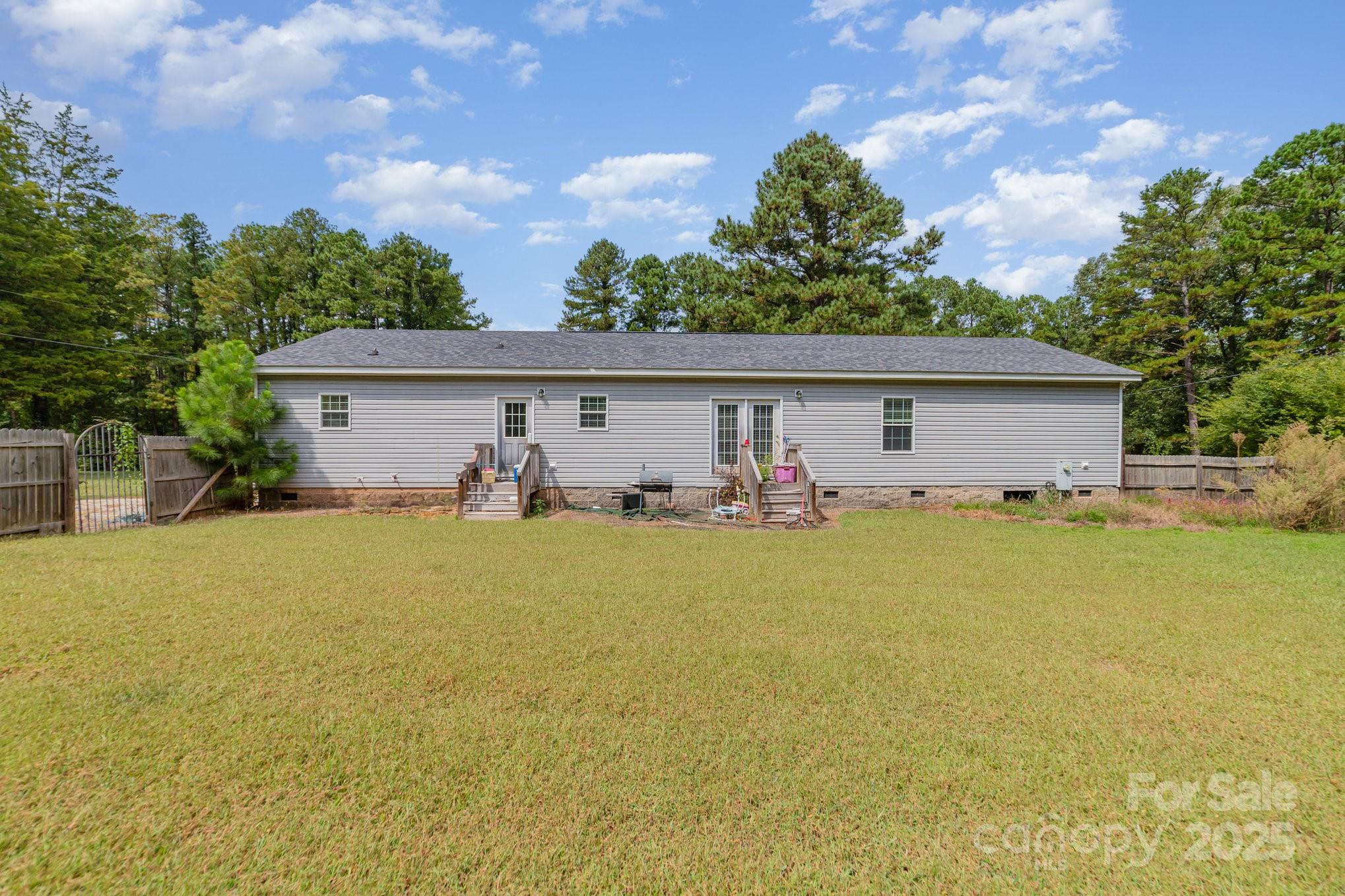 1206 Old Friendship Road Rock Hill, SC 29730 - Photo 7 of 8 a front view of house with yard outdoor seating and barbeque oven