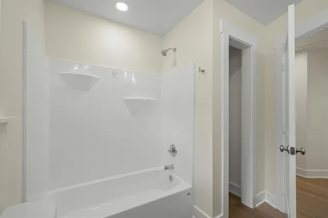 a close view of a bathtub in a bathroom