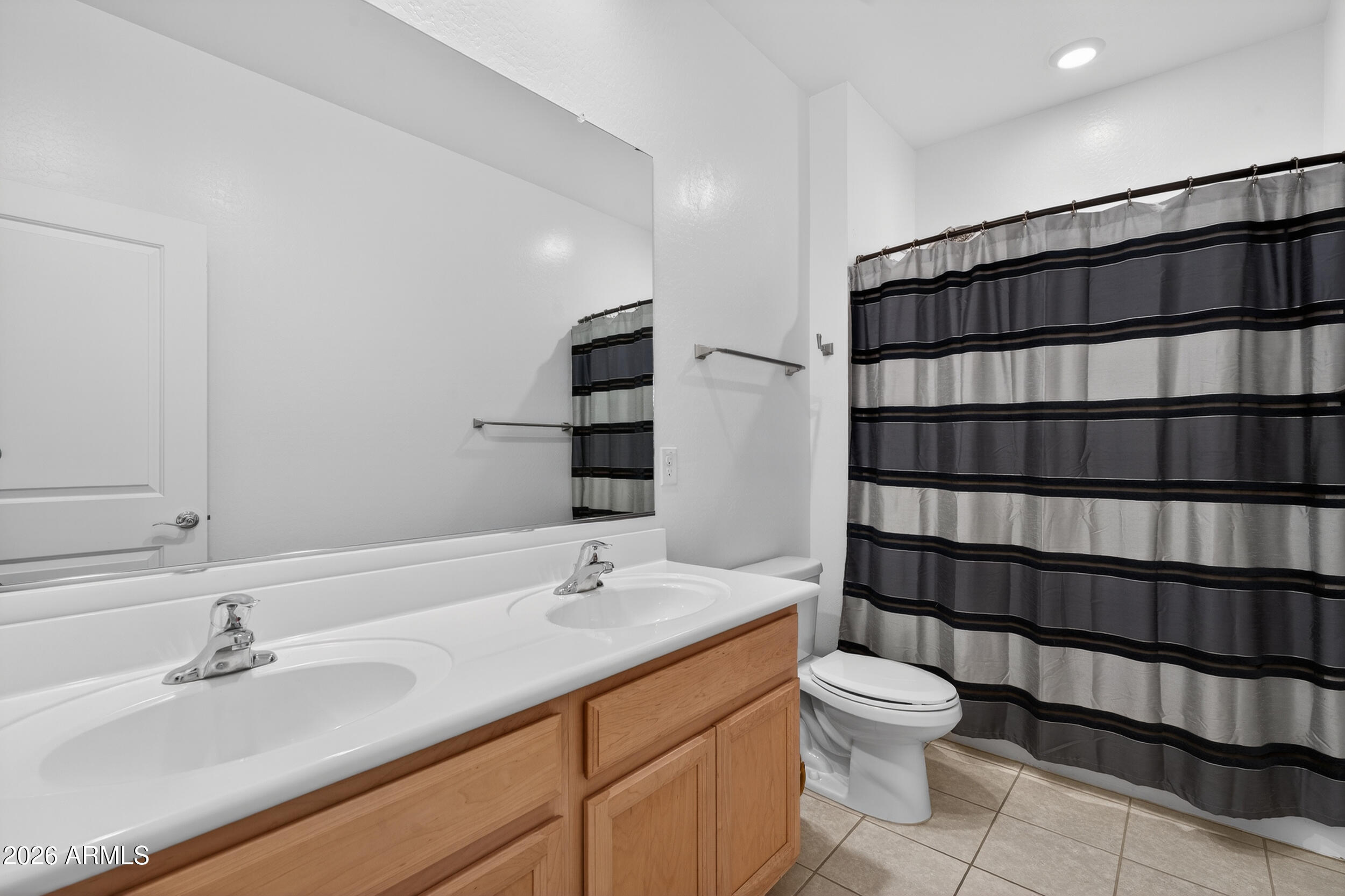 14217 West Pershing Street Surprise, AZ 85379 - Photo 32 of 45 Full Hall Bath w/dual sinks