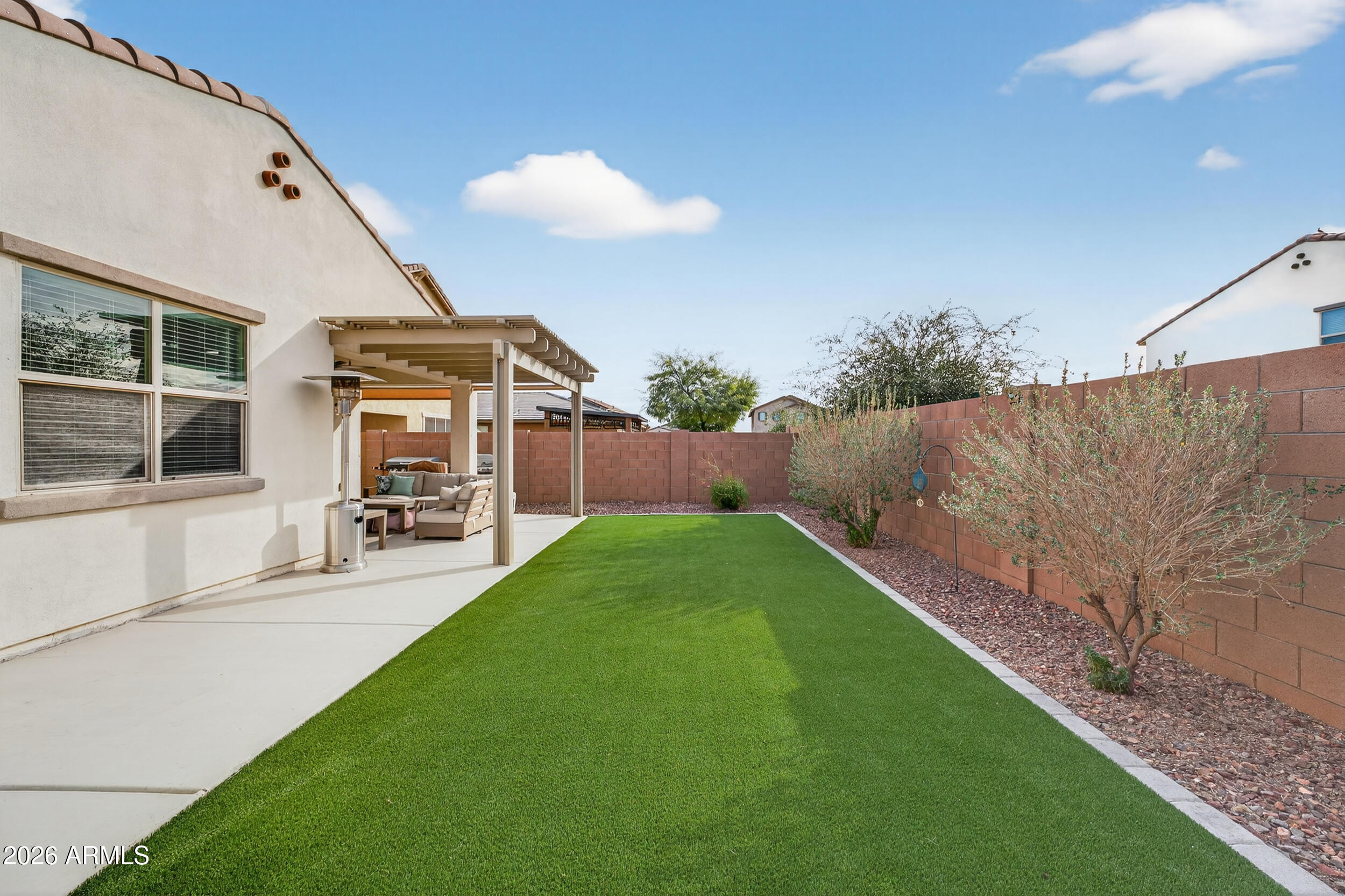 14217 West Pershing Street Surprise, AZ 85379 - Photo 43 of 45 Backyard w/ Artificial Turf