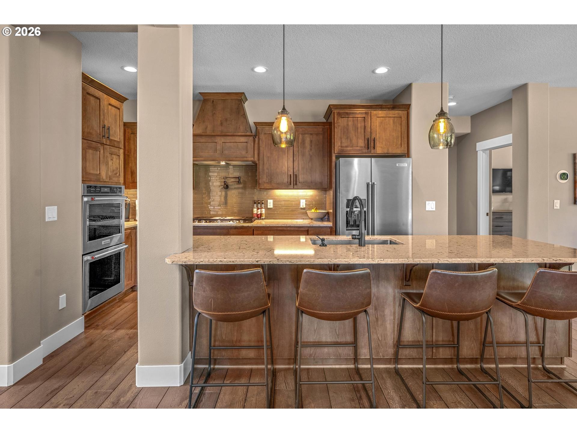 34281 Millard Road Warren, OR 97053 - Photo 11 of 47 a kitchen with a sink and chairs