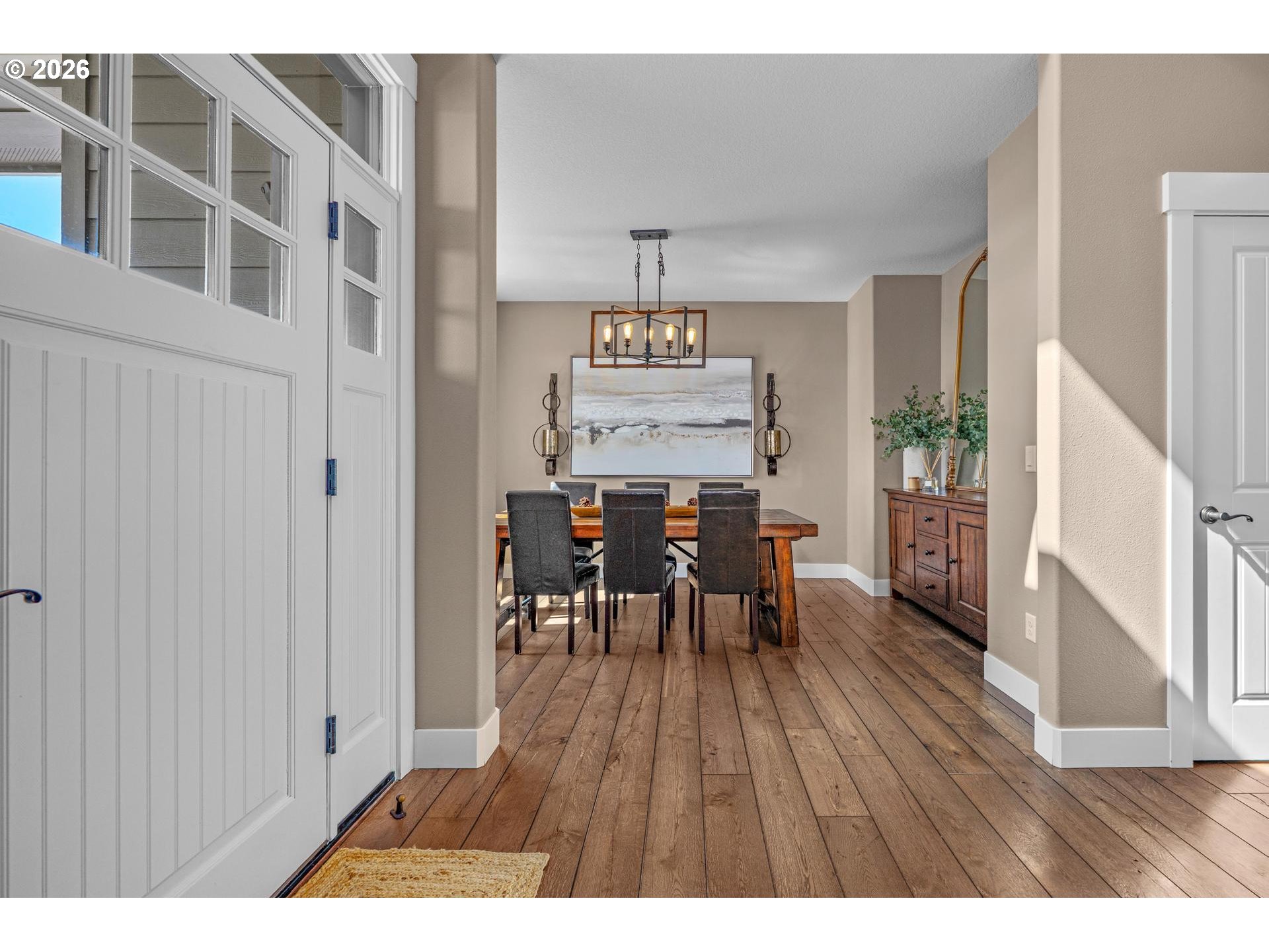 34281 Millard Road Warren, OR 97053 - Photo 21 of 47 a view of a dining room with furniture and wooden floor