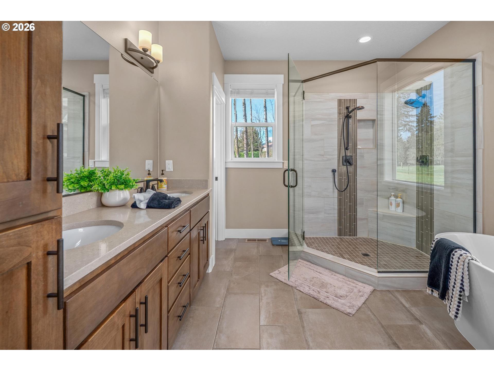34281 Millard Road Warren, OR 97053 - Photo 25 of 47 a bathroom with a granite countertop sink a mirror and a shower