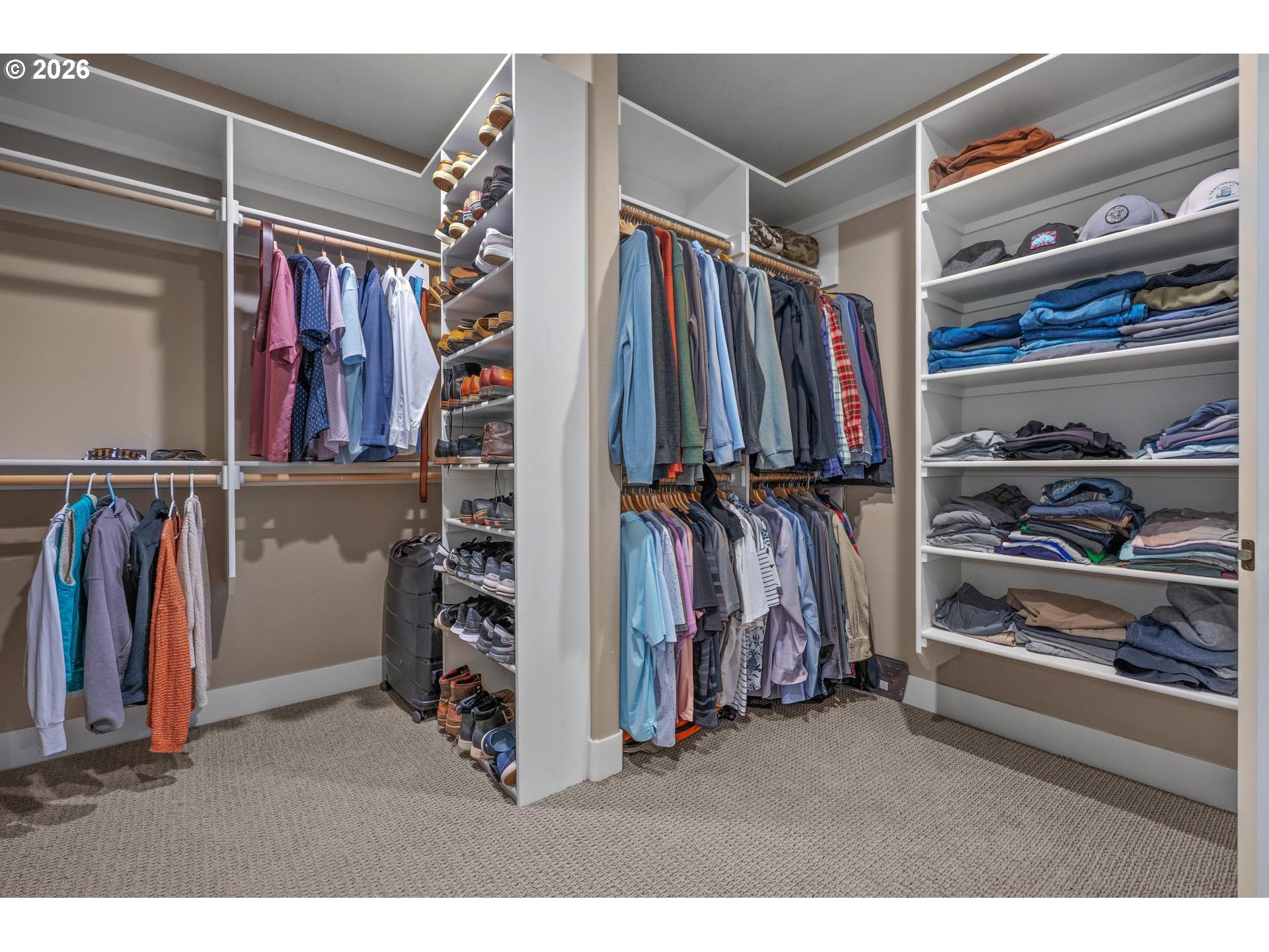 34281 Millard Road Warren, OR 97053 - Photo 27 of 47 a view of walk in closet with clothes and shoes