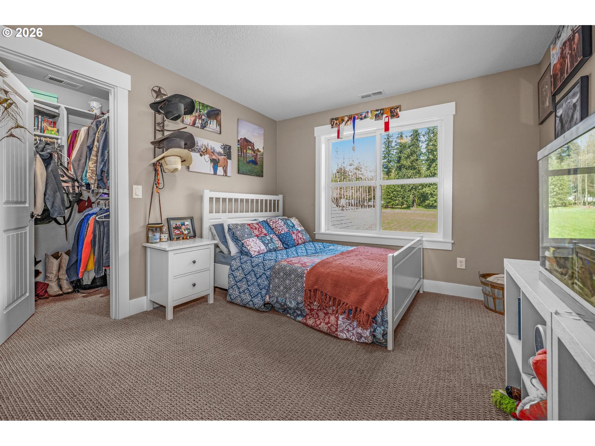 34281 Millard Road Warren, OR 97053 - Photo 38 of 47 a bed room with a bed and a window