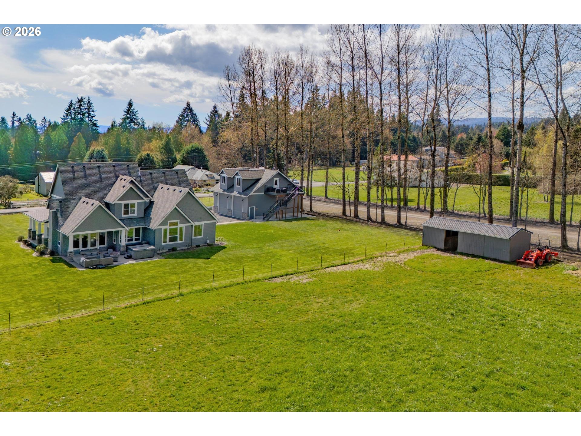 34281 Millard Road Warren, OR 97053 - Photo 6 of 47 a view of a house with a big yard and potted plants