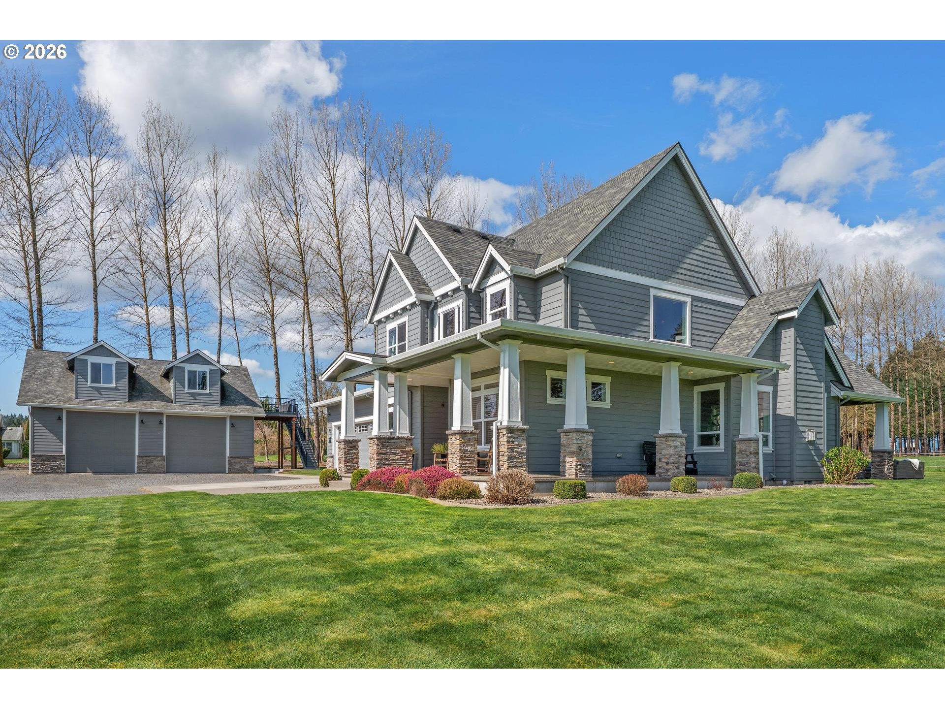 34281 Millard Road Warren, OR 97053 - Photo 7 of 47 a view of a house with a yard table and chairs
