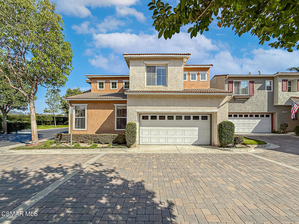 4030 Villamonte Court Camarillo, CA 93010 - Photo 2 of 42 a front view of a house with a yard