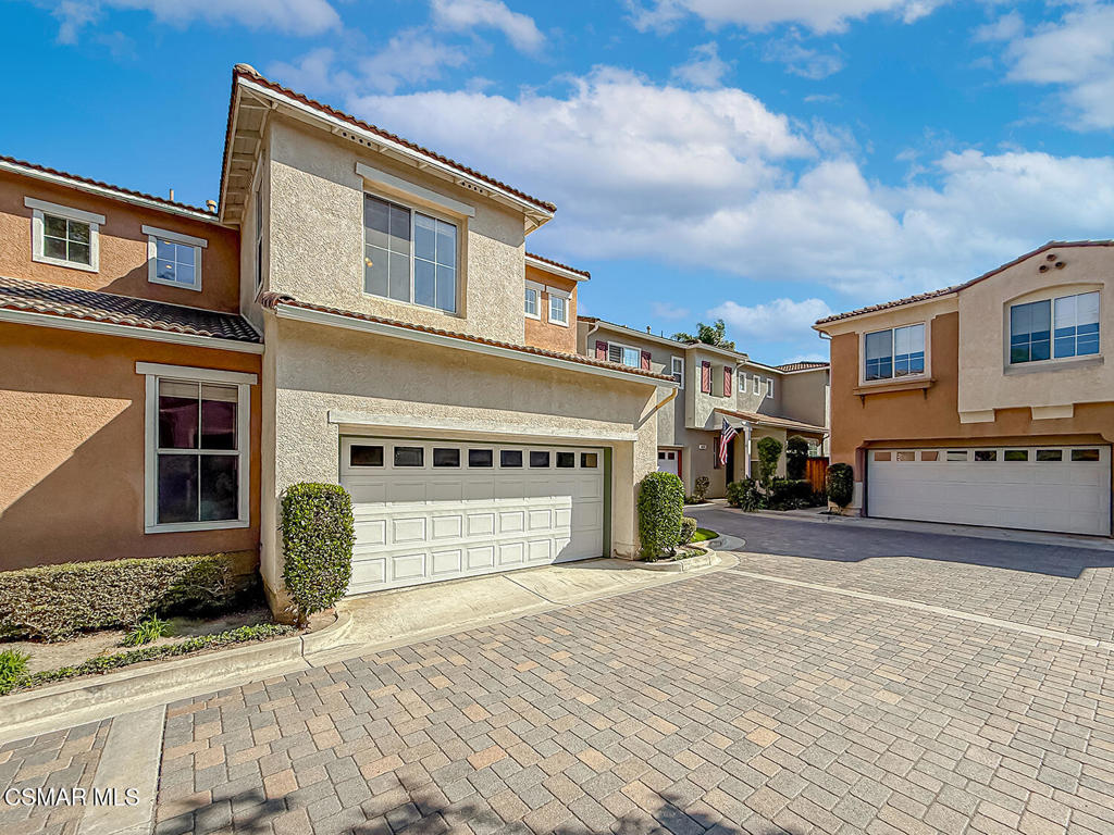 4030 Villamonte Court Camarillo, CA 93010 - Photo 3 of 42 a front view of a house with a yard