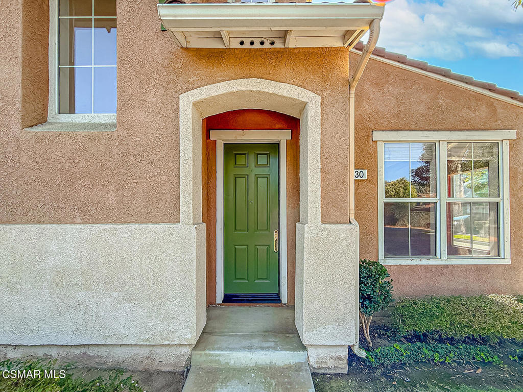 4030 Villamonte Court Camarillo, CA 93010 - Photo 6 of 42 a front view of a house with a outdoor space