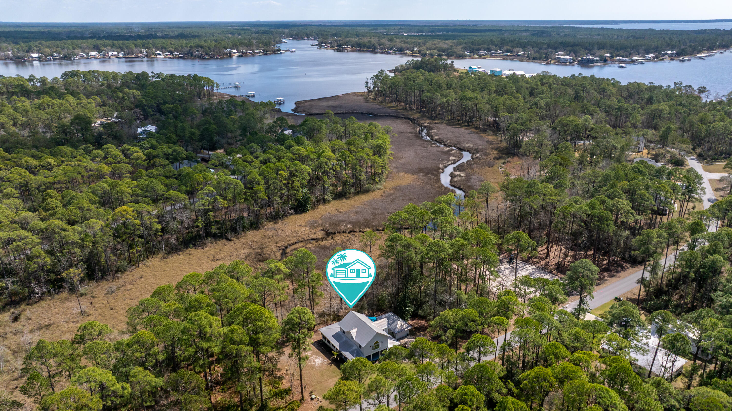 65 Island Grove Drive Freeport, FL 32439 - Photo 2 of 36 zDJI_20260302115423_0611_D2
