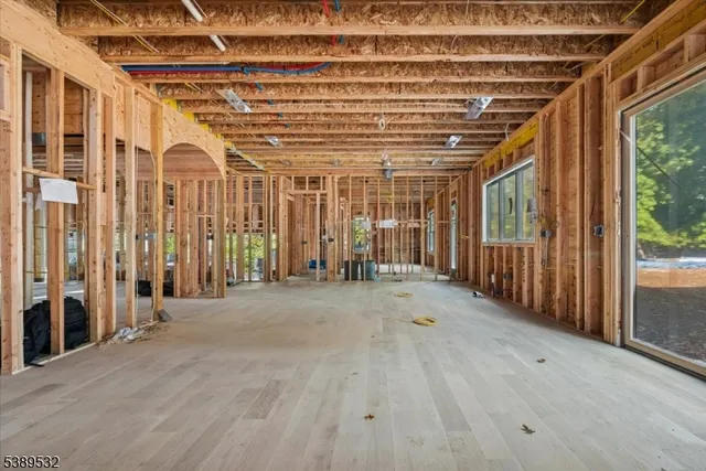 a view of a room with wooden walls