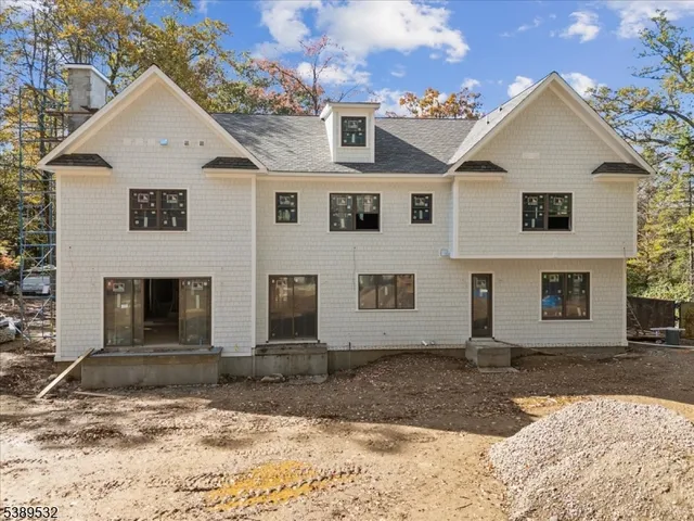 a front view of a house with a garage