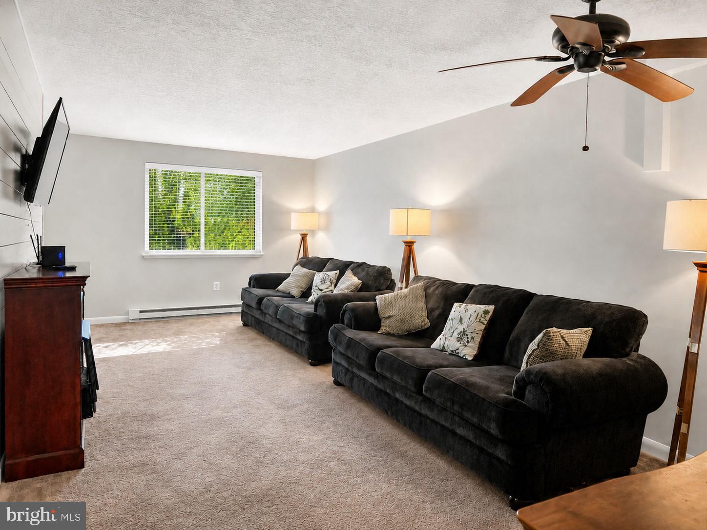 1724 Mosser Road, Unit 11 McHenry, MD 21541 - Photo 4 of 24 a living room with furniture and a window