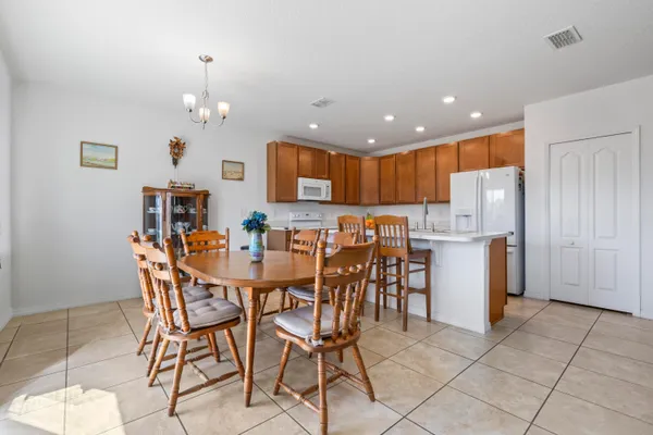 a view of a dining room with furniture