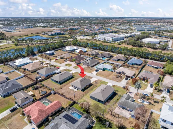 an aerial view of a city with lots of residential buildings